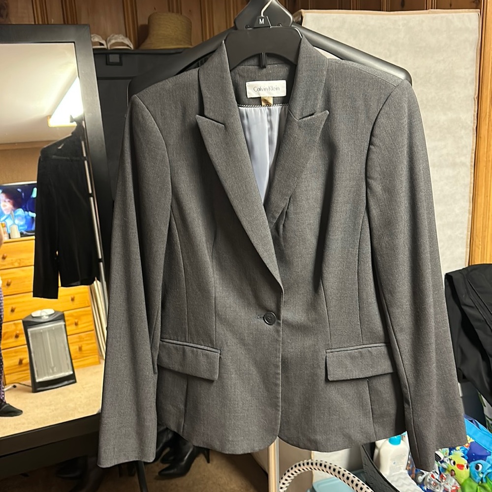 Women’s Calvin Klein suit jacket. Dark gray color. Size 10.